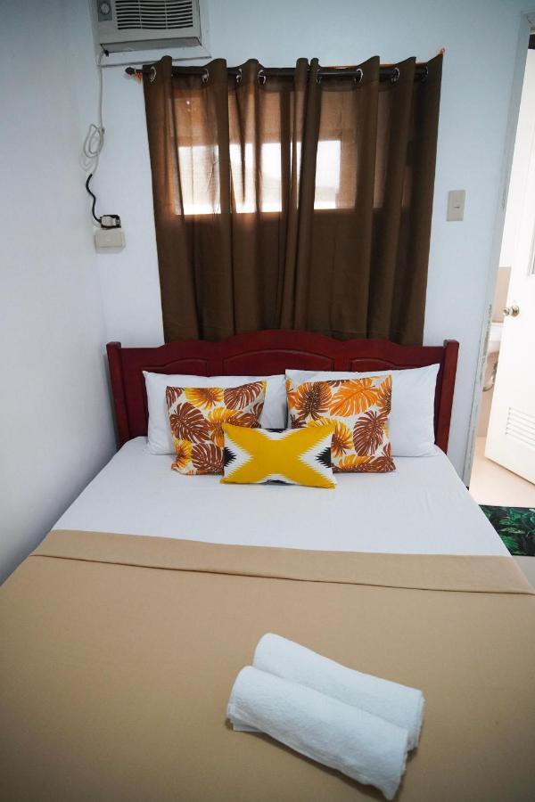 Amparo'S Tourist Inn - โกรอน ภายนอก รูปภาพ