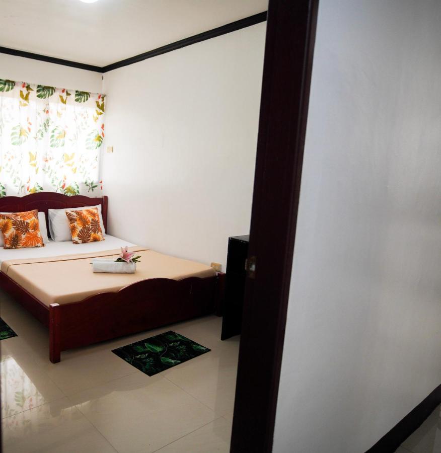 Amparo'S Tourist Inn - โกรอน ภายนอก รูปภาพ