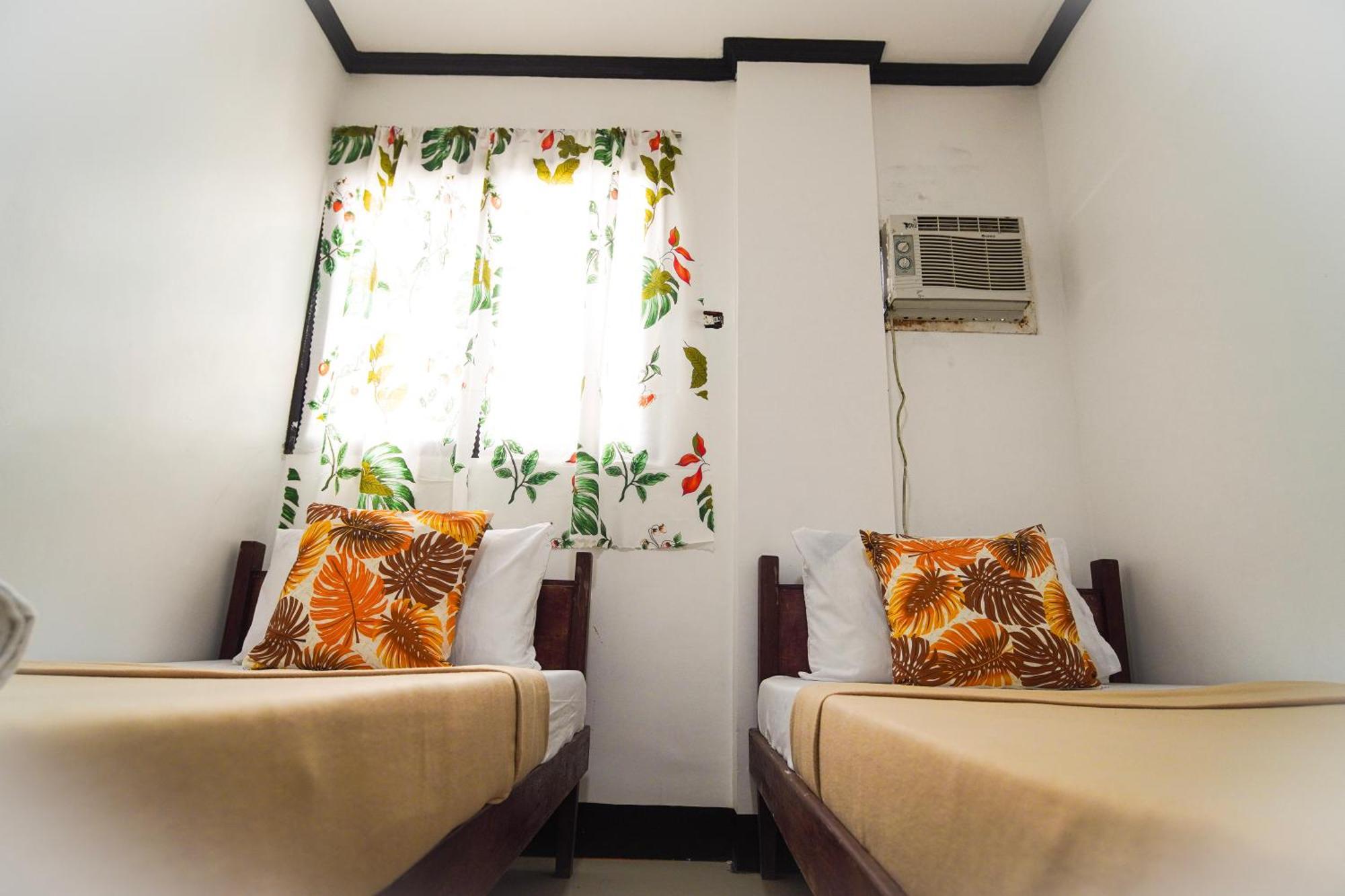 Amparo'S Tourist Inn - โกรอน ภายนอก รูปภาพ
