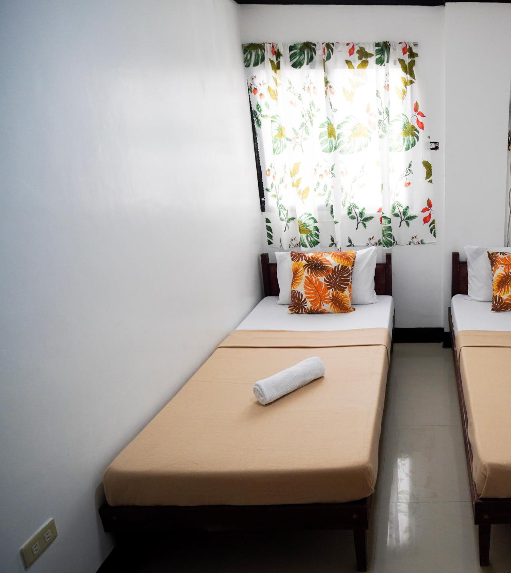 Amparo'S Tourist Inn - โกรอน ภายนอก รูปภาพ